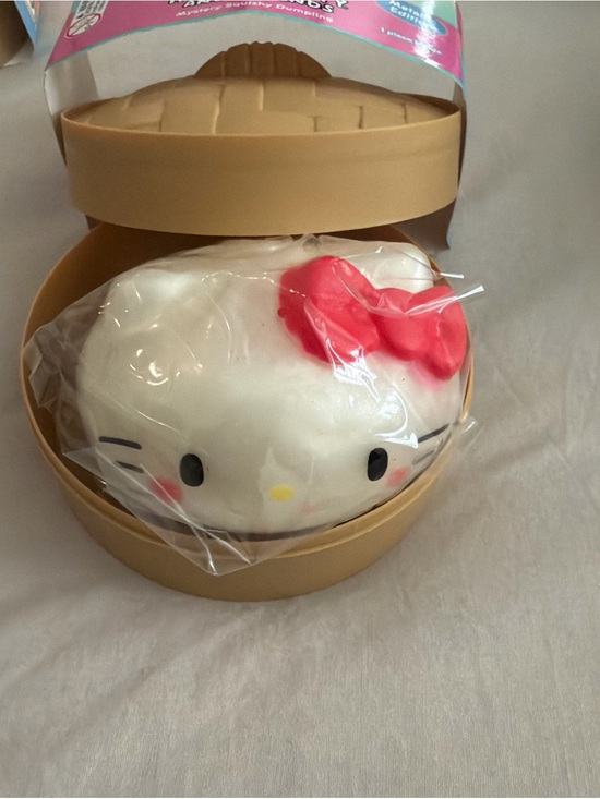 Sanrio Other - Hello Kitty metallic dumpling  - White with Pink Bow